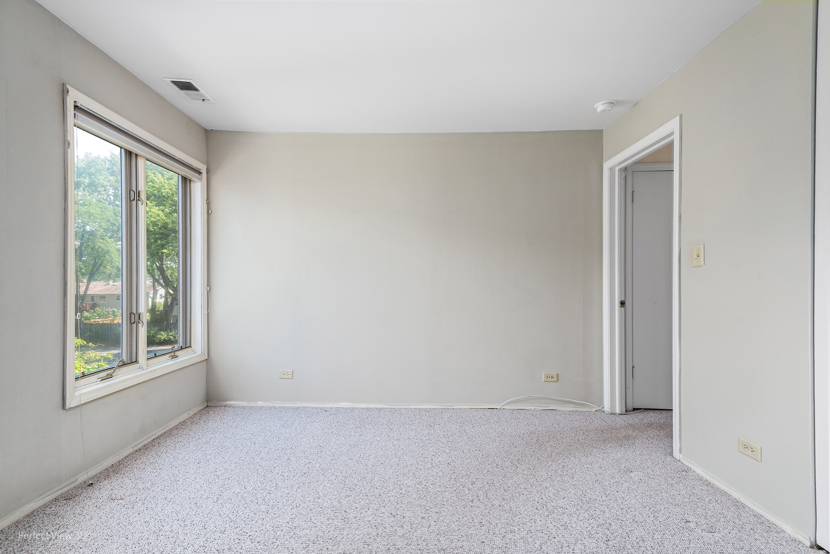 150 Lake Boulevard, Unit 125 Buffalo Grove, IL 60089 - Photo 21 of 30 a view of an empty room with a window