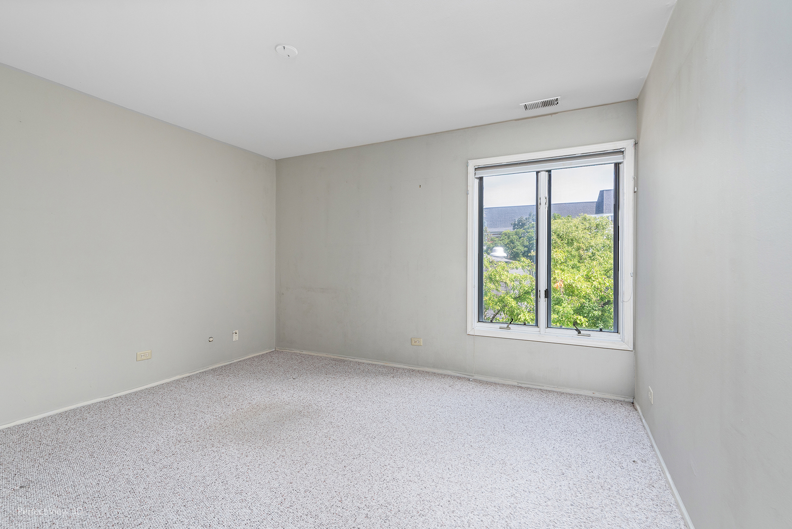 150 Lake Boulevard, Unit 125 Buffalo Grove, IL 60089 - Photo 22 of 30 an empty room with windows