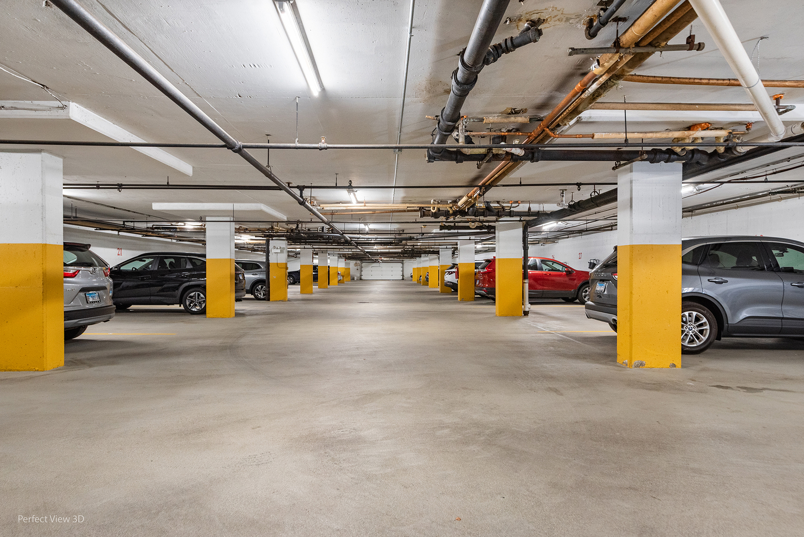 150 Lake Boulevard, Unit 125 Buffalo Grove, IL 60089 - Photo 24 of 30 a view of parking garage with cars