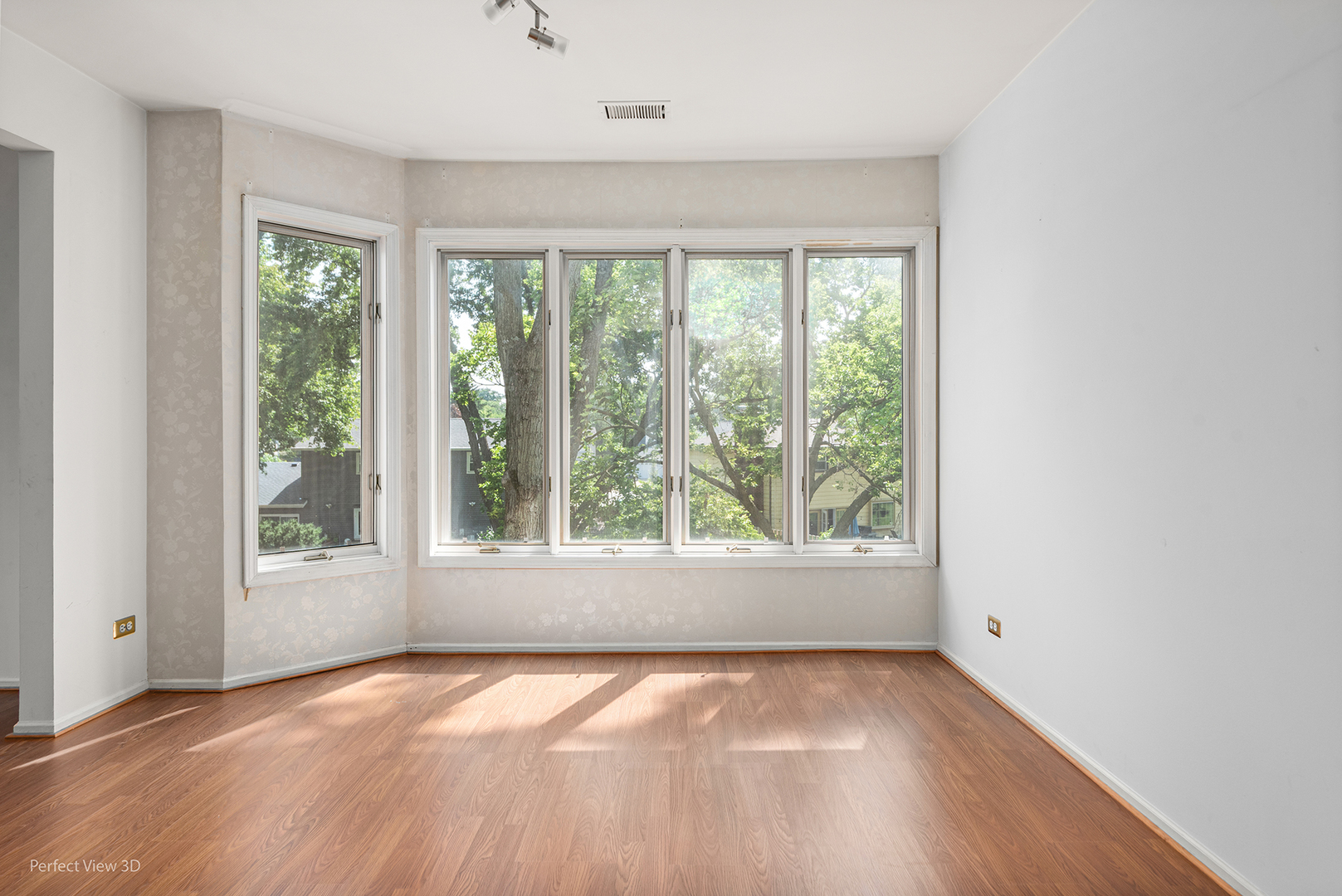 150 Lake Boulevard, Unit 125 Buffalo Grove, IL 60089 - Photo 9 of 30 an empty room with a window