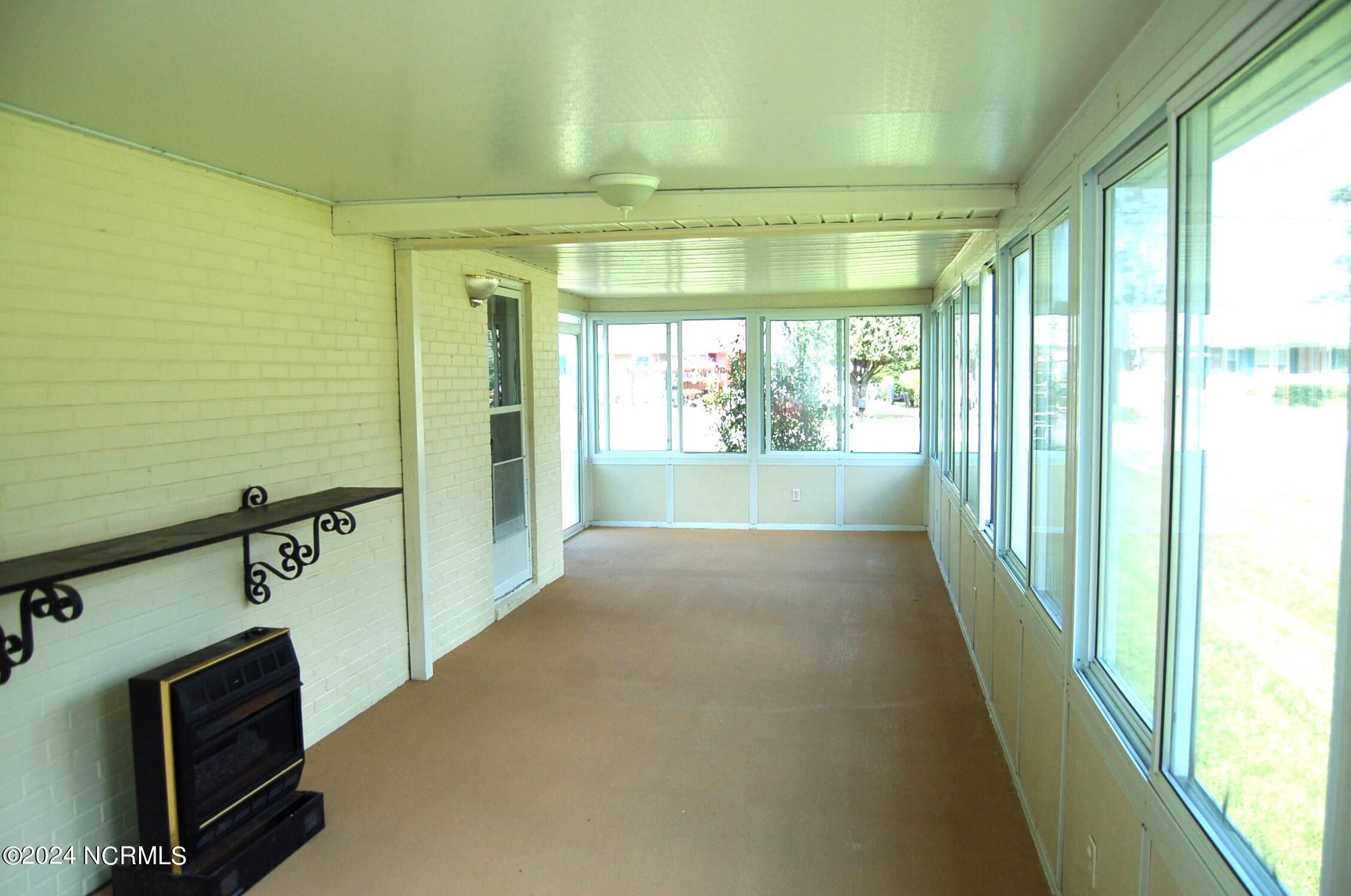 617 Lee Drive Havelock, NC 28532 - Photo 20 of 20 This space is not included in the square footage of the home because it is not adjoined to the heat & air system. Still a very pleasant space to spend time with family and friends.