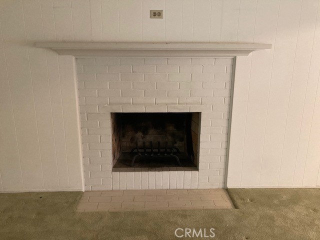 4948 Granada Avenue Riverside, CA 92504 - Photo 22 of 33 a view of an empty room with a fireplace