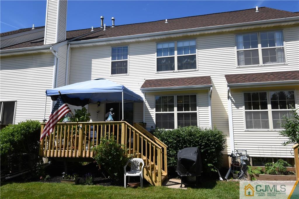 171 Salem Road North Brunswick, NJ 08902 - Photo 13 of 44 a view of a house with a yard and potted plants