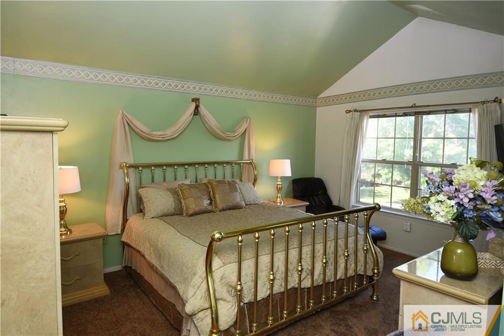 171 Salem Road North Brunswick, NJ 08902 - Photo 20 of 44 a bedroom with a bed and window