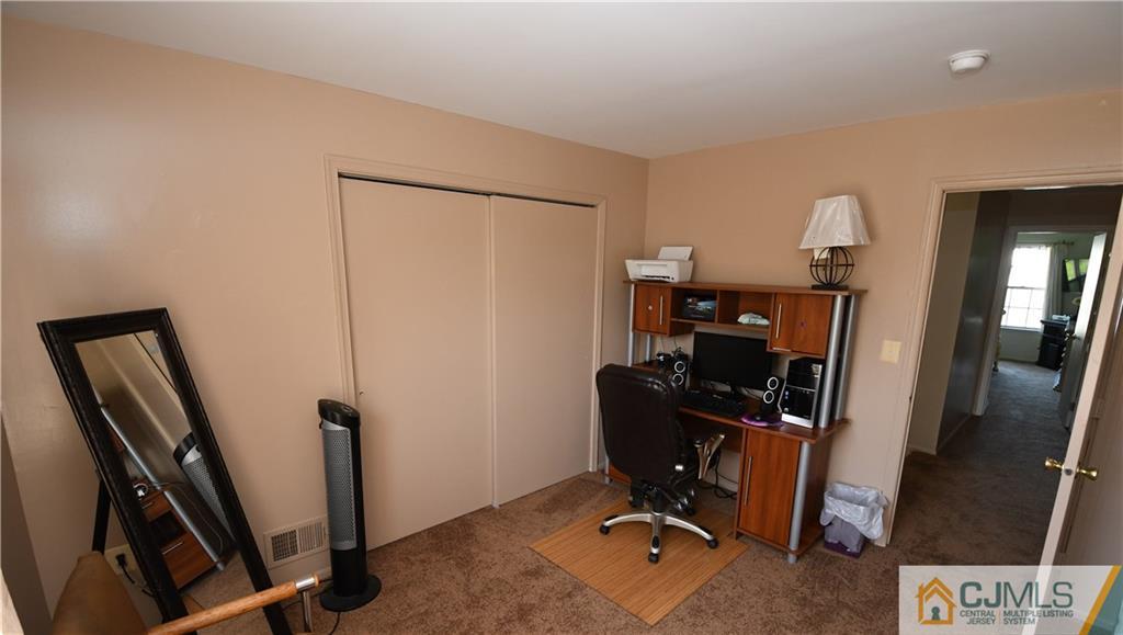 171 Salem Road North Brunswick, NJ 08902 - Photo 28 of 44 a view of a room with gym equipment