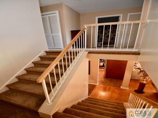 171 Salem Road North Brunswick, NJ 08902 - Photo 31 of 44 a view of entryway and hall with wooden floor