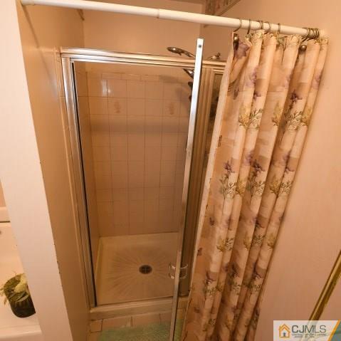 171 Salem Road North Brunswick, NJ 08902 - Photo 33 of 44 a bathroom with a shower and a sink