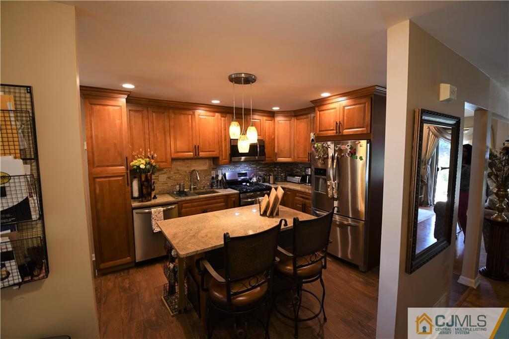 171 Salem Road North Brunswick, NJ 08902 - Photo 42 of 44 a view of a dining room with furniture