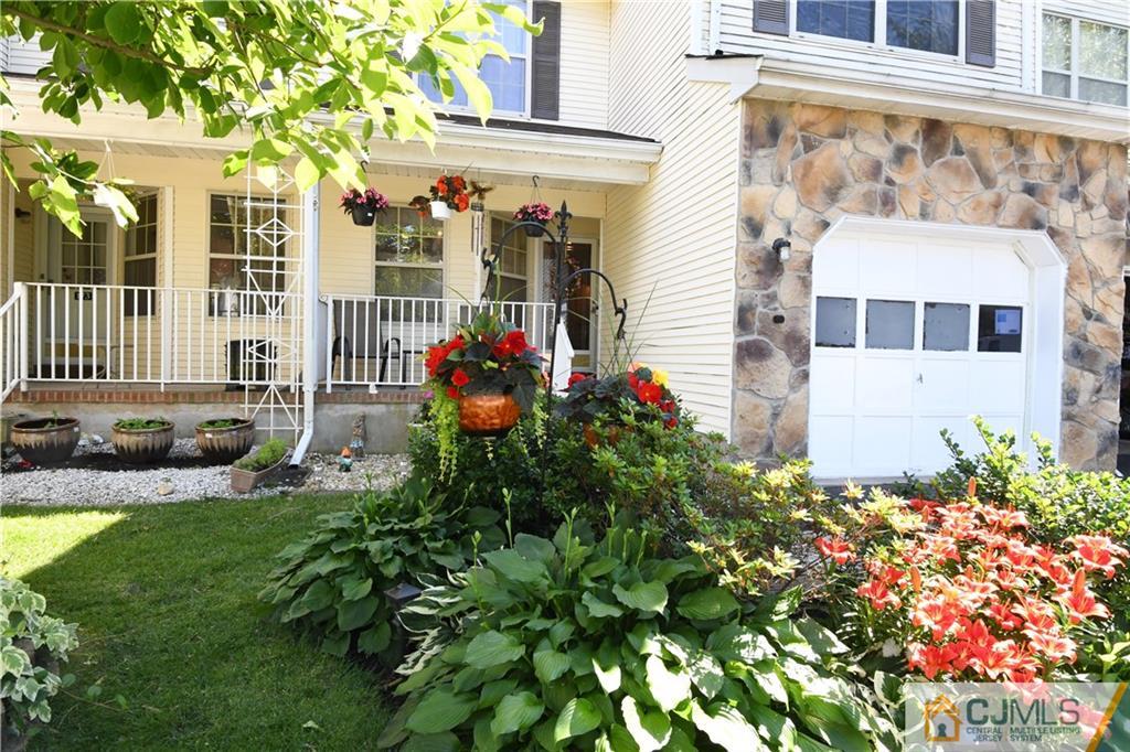171 Salem Road North Brunswick, NJ 08902 - Photo 44 of 44 a front view of a house with a garden