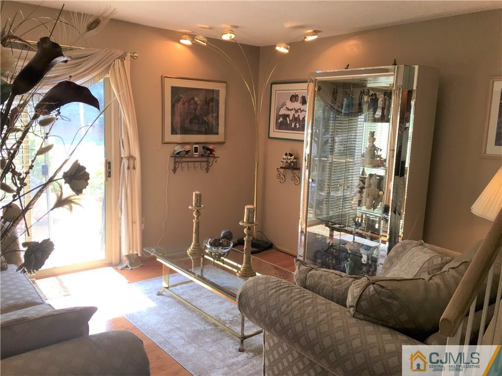 171 Salem Road North Brunswick, NJ 08902 - Photo 6 of 44 a living room with furniture and a window