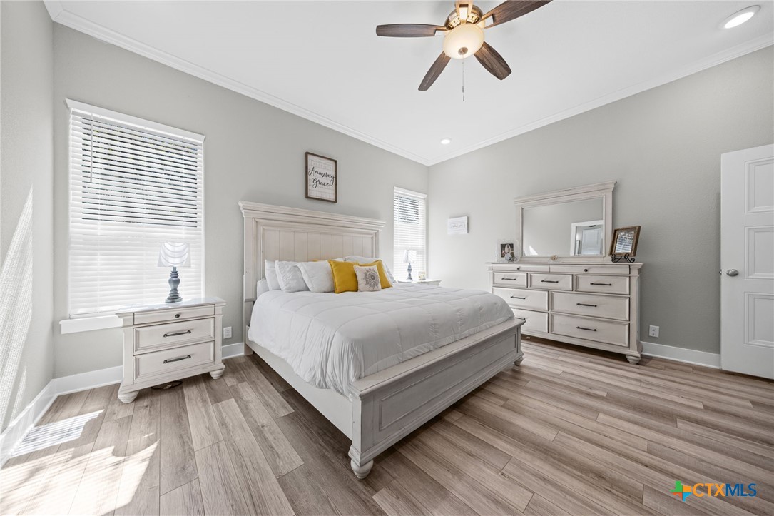 28099 Fm 2670 Killeen, TX 76549 - Photo 12 of 48 a bedroom with a bed and a chandelier