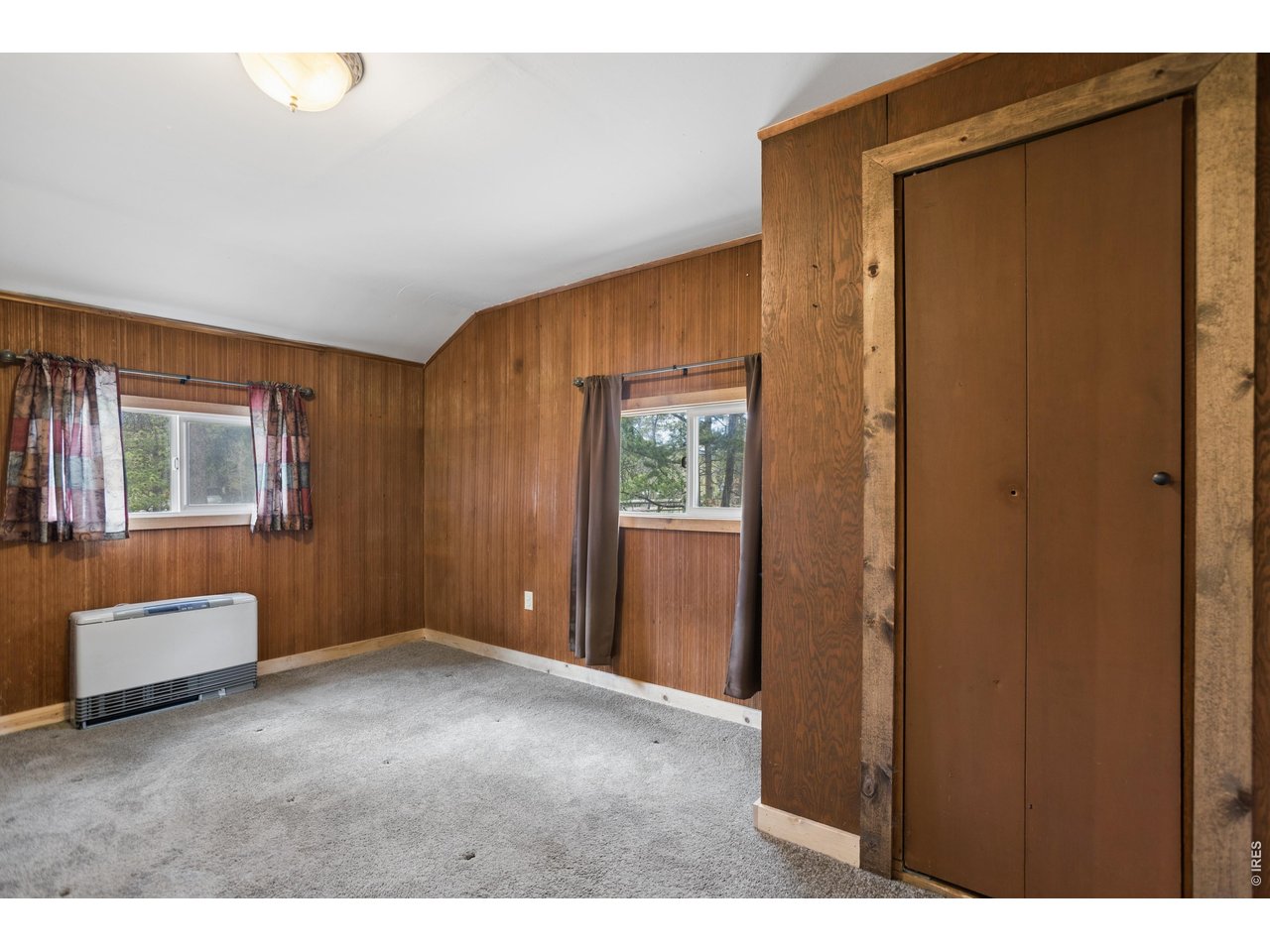 27 Gap Road Black Hawk, CO 80422 - Photo 21 of 36 a view of an empty room with a window
