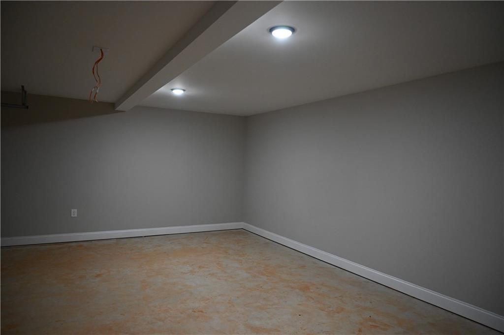 2978 Cannon Bridge Road Demorest, GA 30535 - Photo 19 of 36 an empty room with a empty space and windows