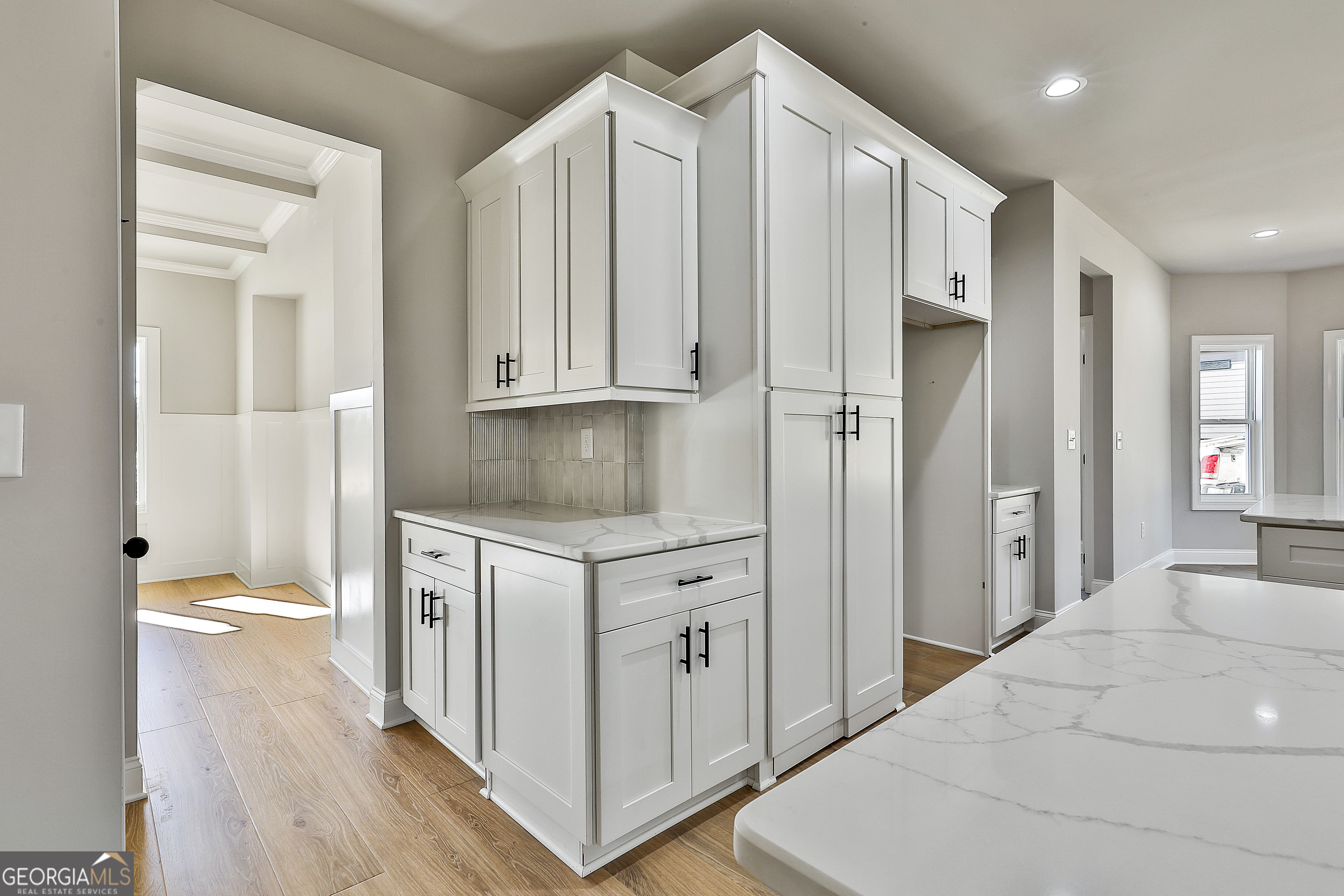 174 Tattersall Way, Unit 5100 Senoia, GA 30276 - Photo 15 of 40 a kitchen with stainless steel appliances a refrigerator sink and cabinets