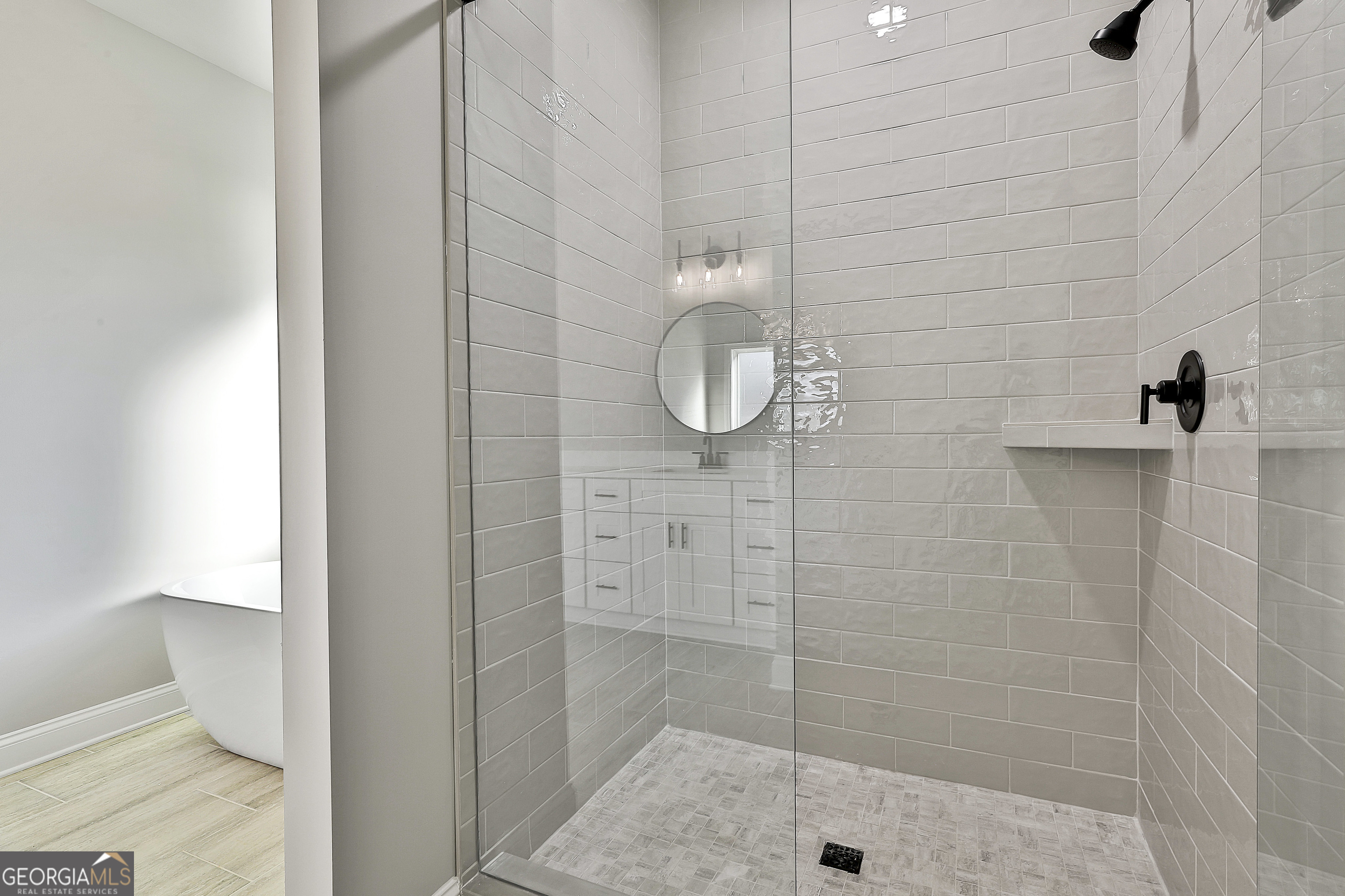 174 Tattersall Way, Unit 5100 Senoia, GA 30276 - Photo 31 of 40 a bathroom with a shower