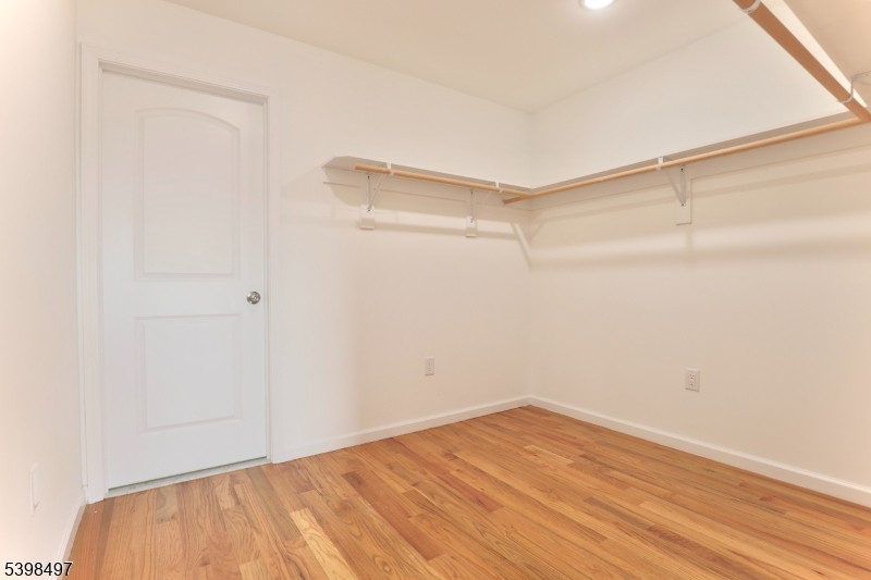 32 Garibaldi Avenue, Unit 3 Newark, NJ 07114 - Photo 18 of 20 a view of a room with wooden floor