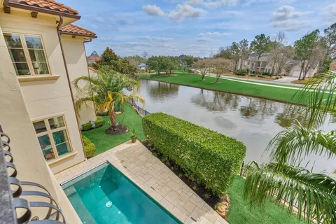 a backyard of a house with lots of green space