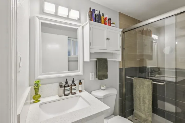 a view of a backyard with sitting area and tub