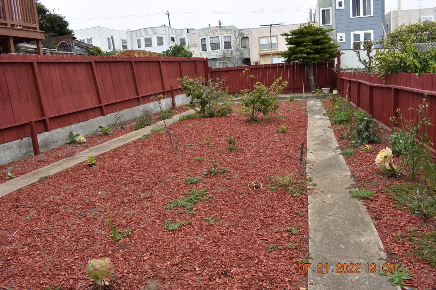 2270 22nd Avenue San Francisco, CA 94116 - Photo 2 of 12 a view of a pathway with a flower plants