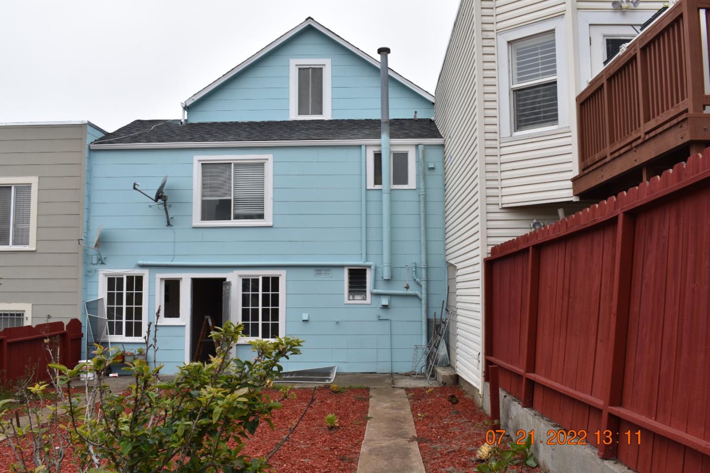 2270 22nd Avenue San Francisco, CA 94116 - Photo 3 of 12 a view of a house with wooden fence and potted plants
