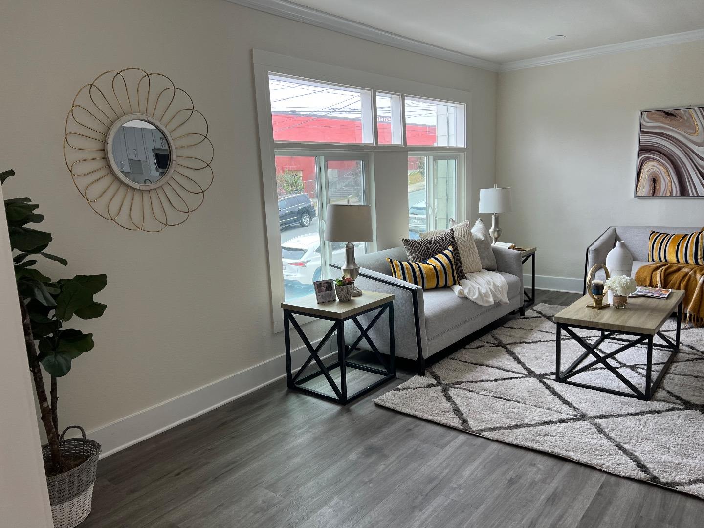 2270 22nd Avenue San Francisco, CA 94116 - Photo 5 of 12 a living room with furniture a window and wooden floor