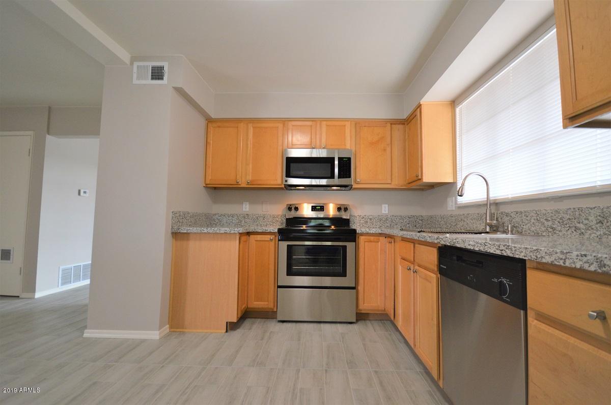 3832 West Lamar Road Phoenix, AZ 85019 - Photo 8 of 24 DSC_1118