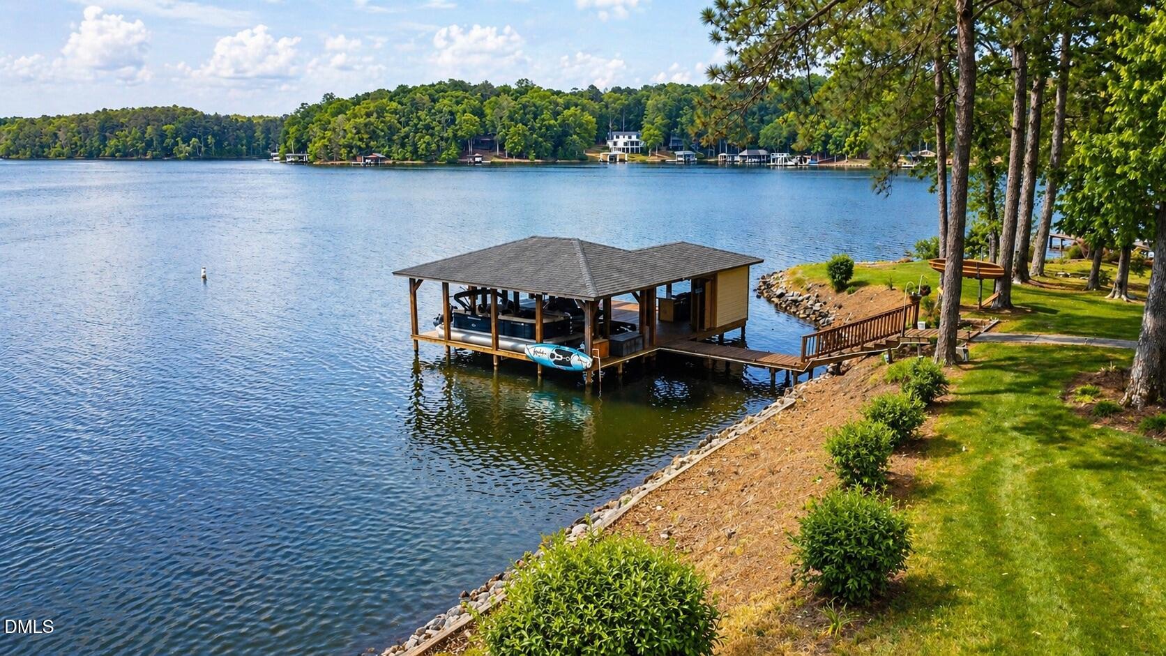 118 Paradise Point Macon, NC 27551 - Photo 21 of 28 an aerial view of a house with a lake view
