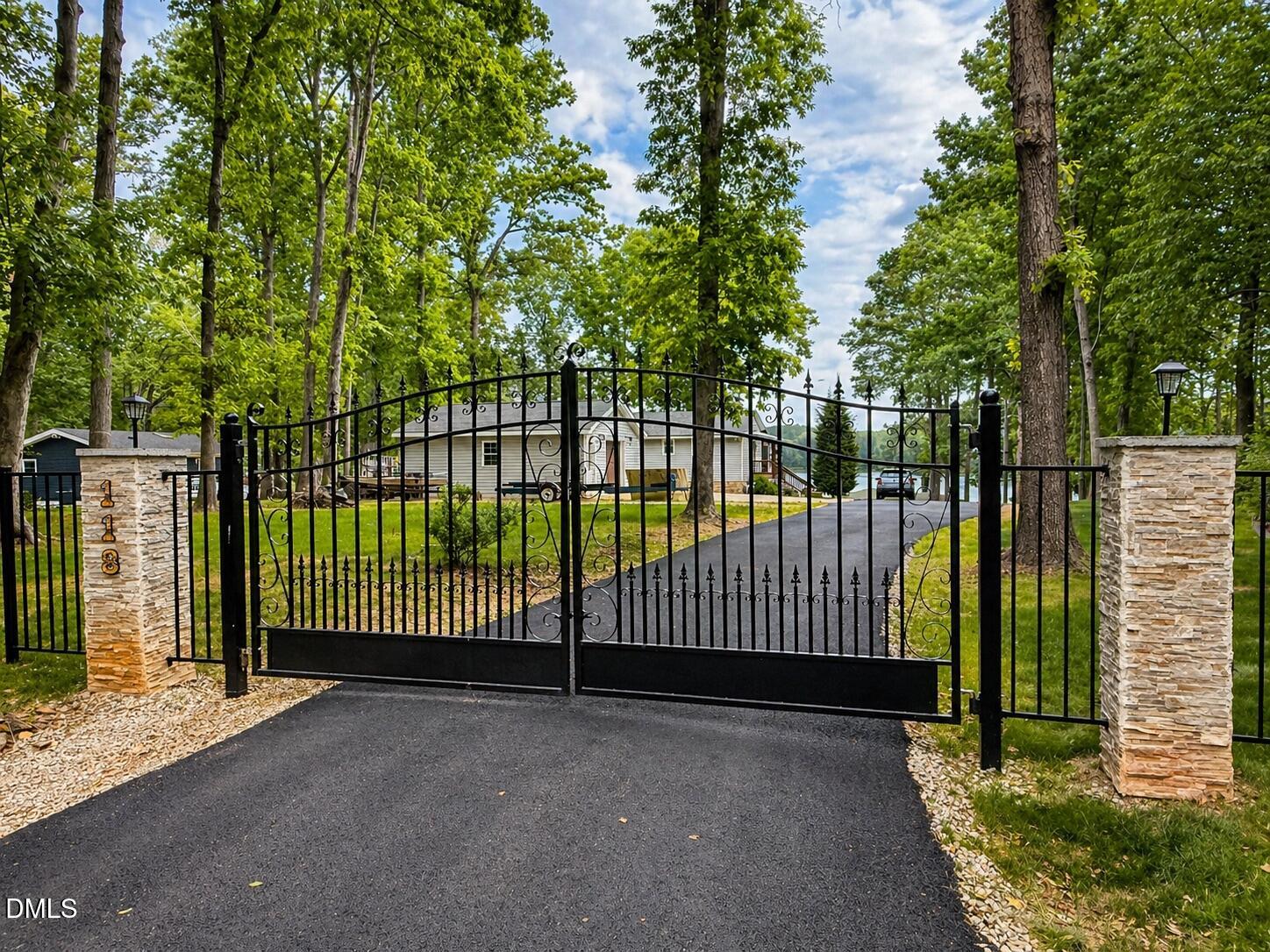 118 Paradise Point Macon, NC 27551 - Photo 22 of 28 a view of a gate with a street view