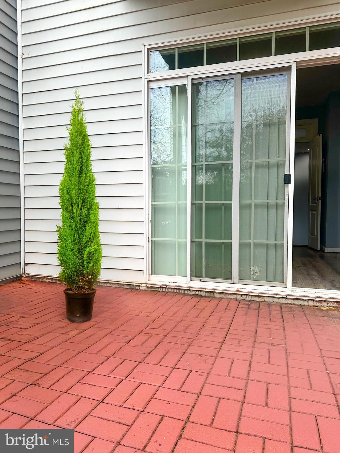 7444 Riding Meadow Way Manassas, VA 20111 - Photo 18 of 36 a view of a entryway door of the house