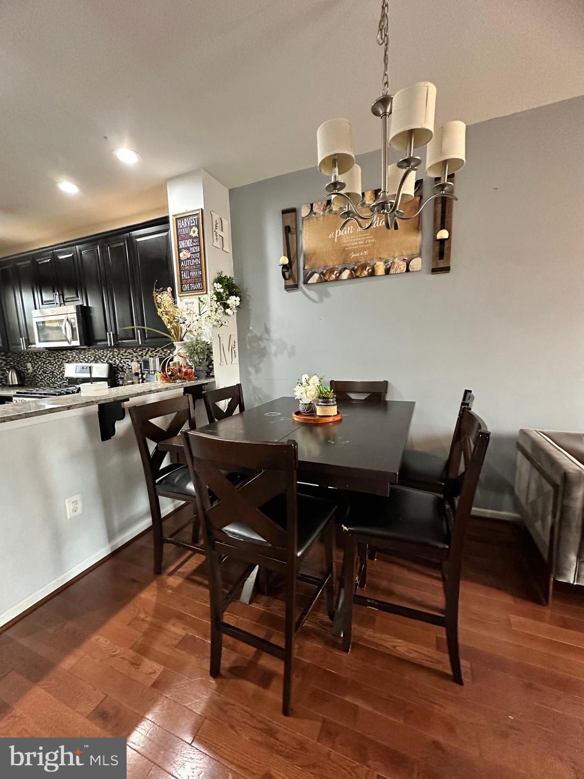 7444 Riding Meadow Way Manassas, VA 20111 - Photo 5 of 36 a view of a dining room with furniture