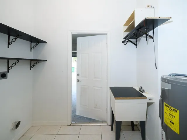 a bathroom with a sink and a shower