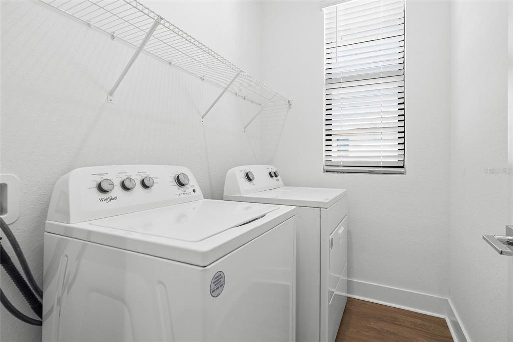 14413 Stellar Place Lakewood Ranch, FL 34202 - Photo 24 of 44 a utility room with dryer and washer