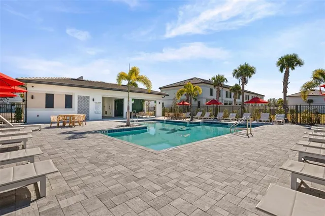 a view of multiple houses with a yard
