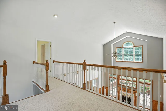 a view of hallway with windows