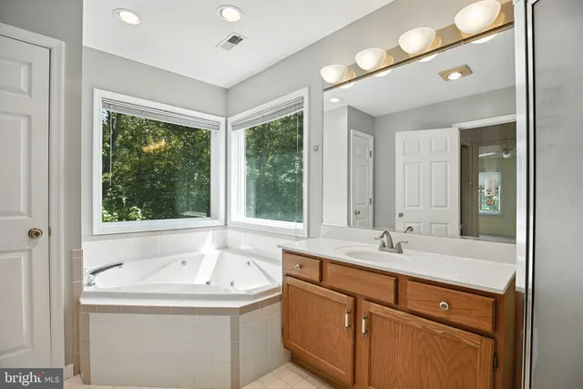 a bathroom with a sink and a bathtub