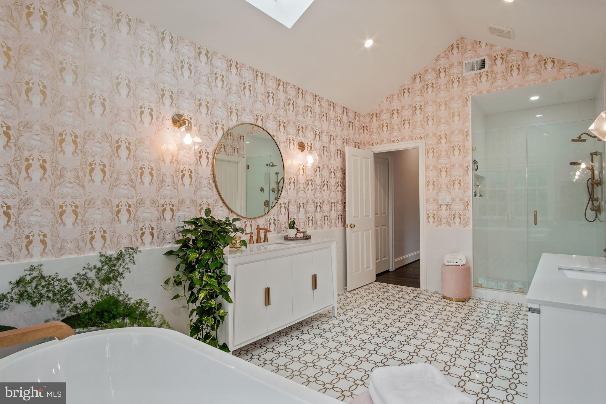 5602 Newington Road Bethesda, MD 20816 - Photo 19 of 34 Vaulted ceiling with skylights