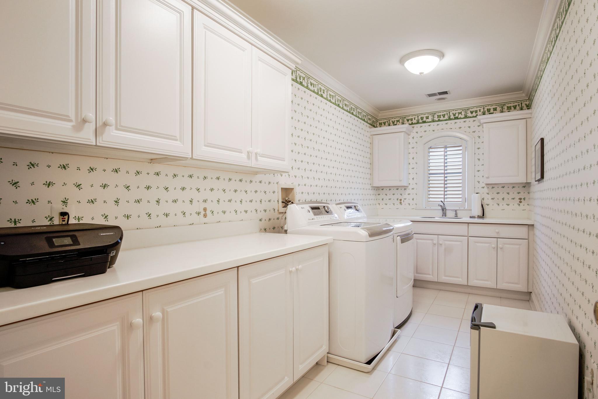 5602 Newington Road Bethesda, MD 20816 - Photo 22 of 34 Spacious Laundry Room w/ample cabinet space