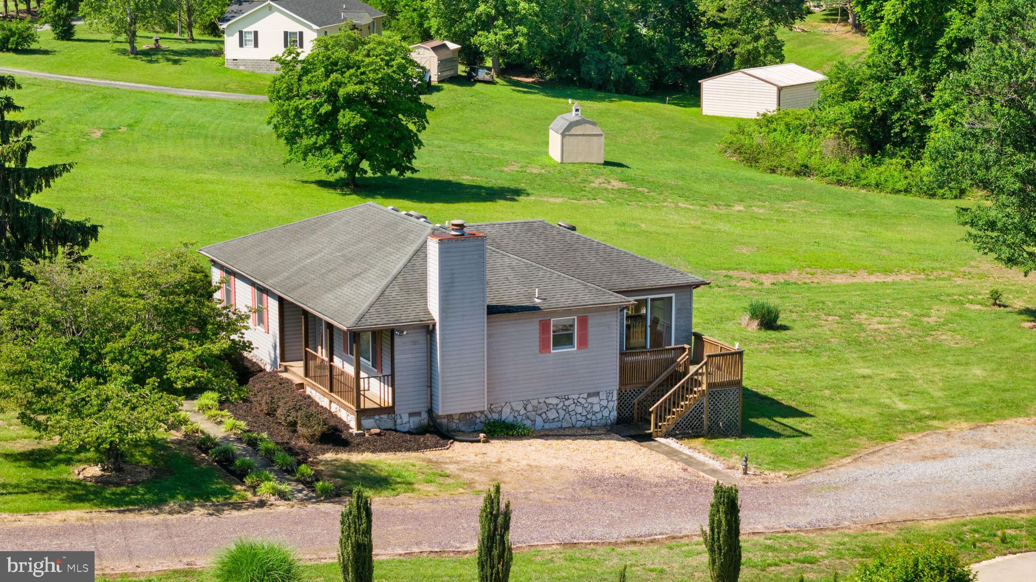 161 Troy Road Louisa, VA 23093 - Photo 3 of 60 a aerial view of a house with swimming pool garden and patio
