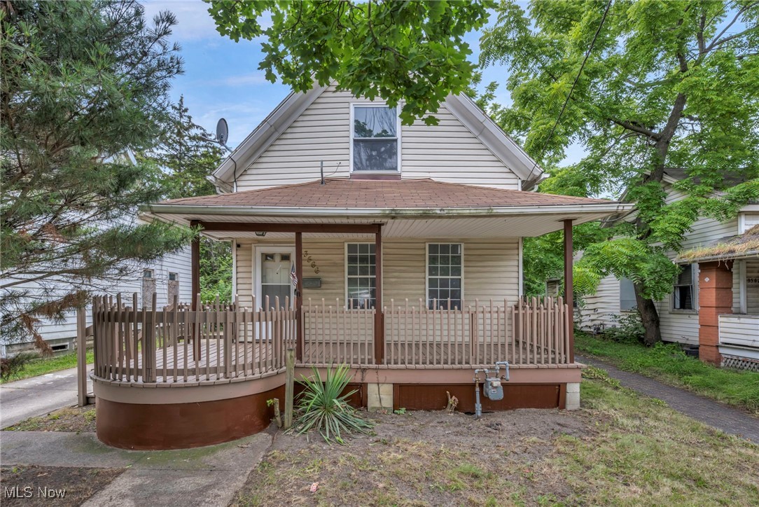 3566 Sykora Road Cleveland, OH 44105 - Photo 1 of 32 View of front of house featuring a porch and a shingled roof