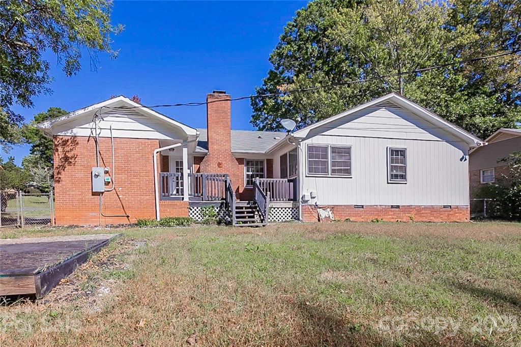 7410 Marlbrook Drive Charlotte, NC 28212 - Photo 16 of 16 a front view of a house with patio