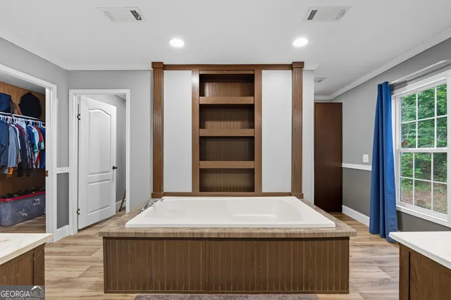 a room with closet and a window