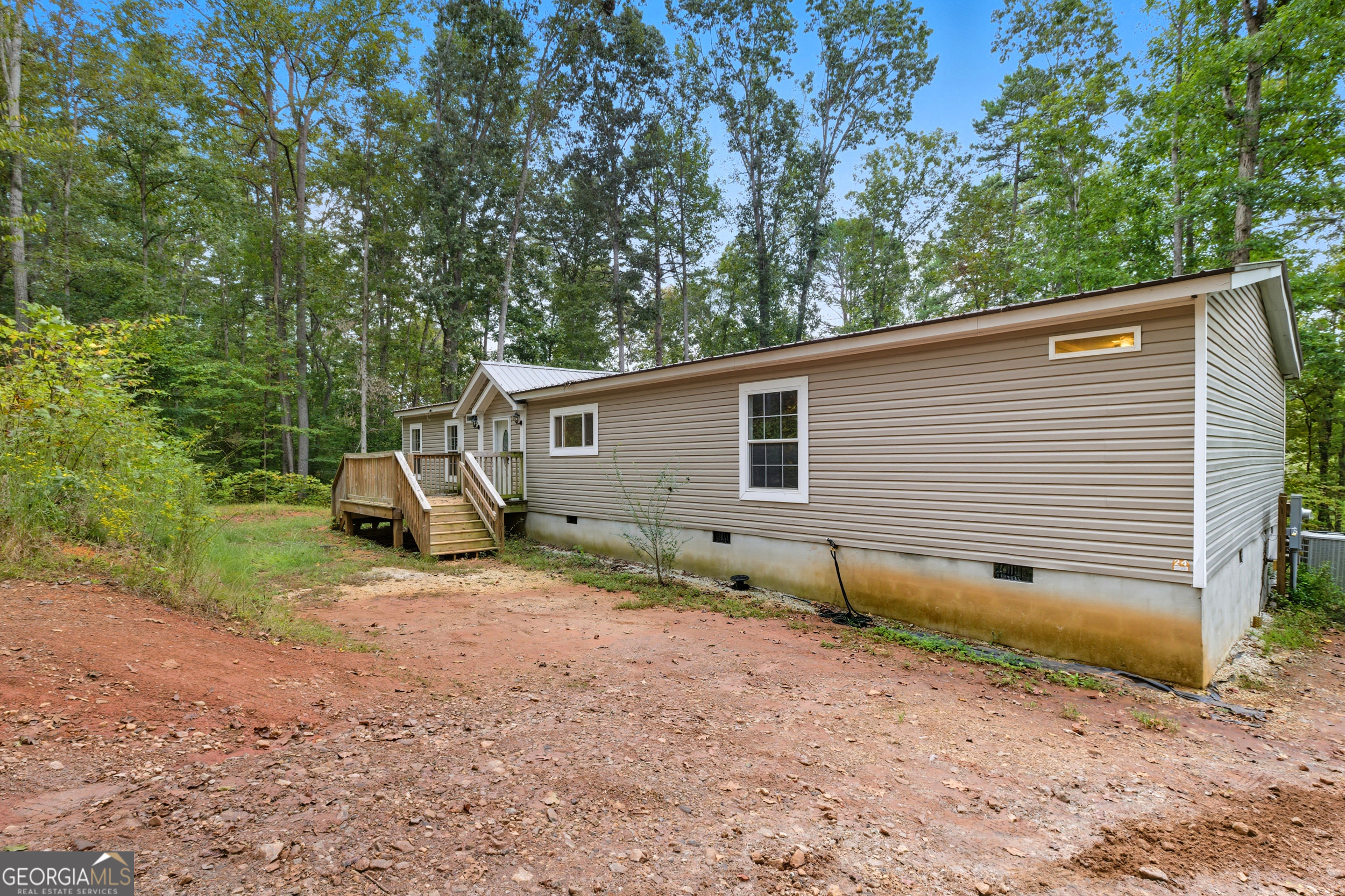 567 Cherokee Road Toccoa, GA 30577 - Photo 2 of 32 a view of a house with backyard and trees