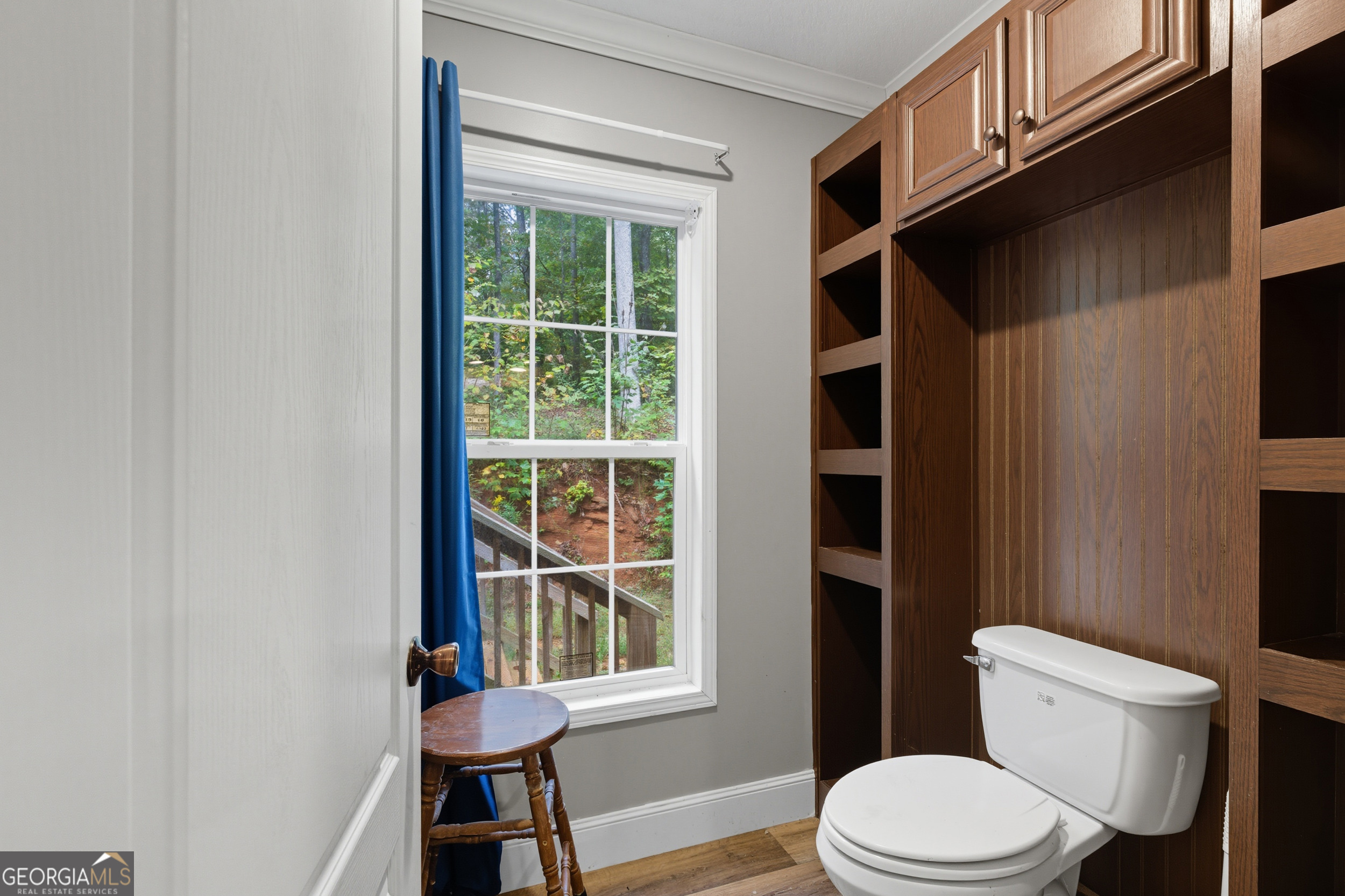 567 Cherokee Road Toccoa, GA 30577 - Photo 24 of 32 a white toilet sitting next to a window
