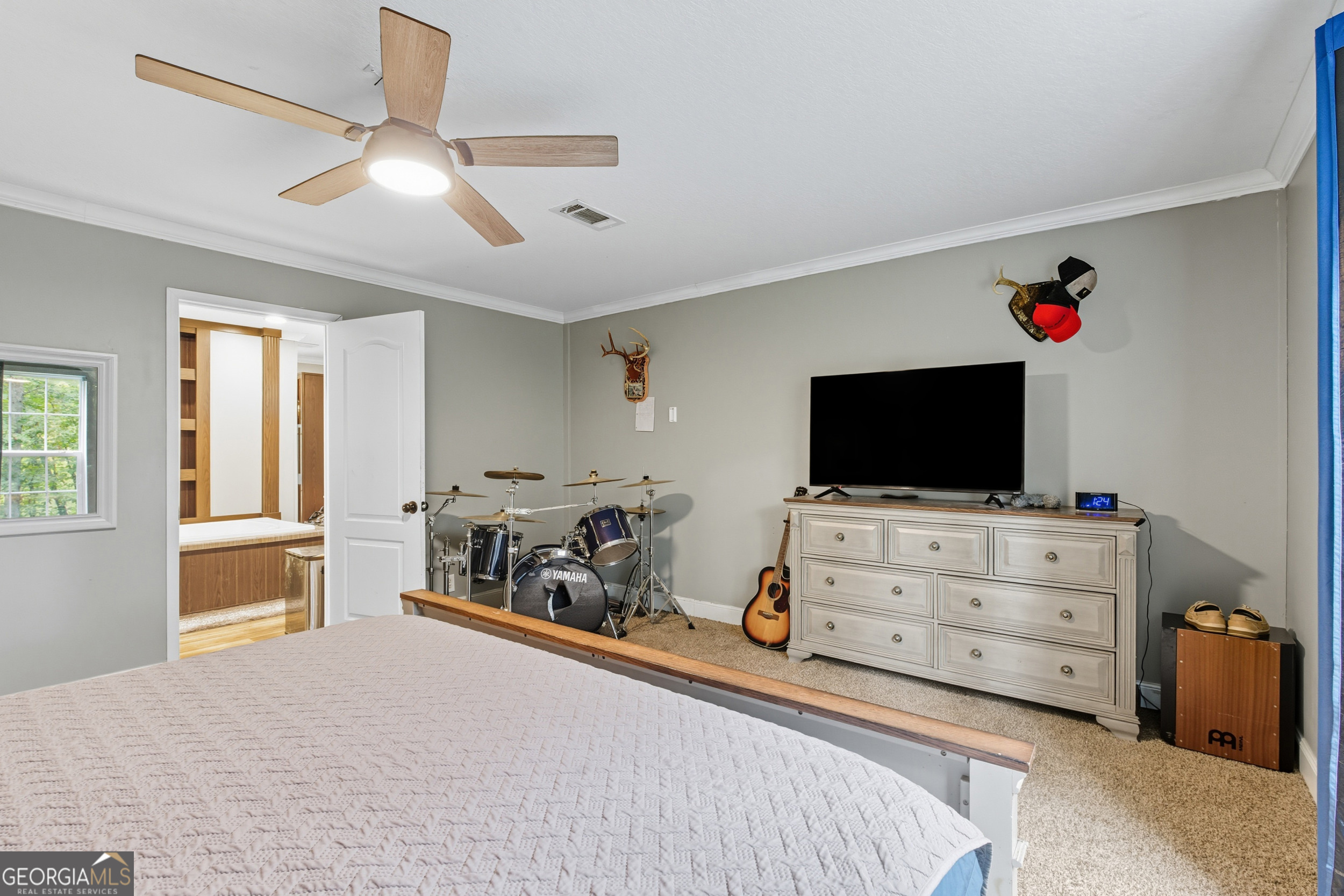 567 Cherokee Road Toccoa, GA 30577 - Photo 10 of 32 a bedroom with furniture and a flat screen tv