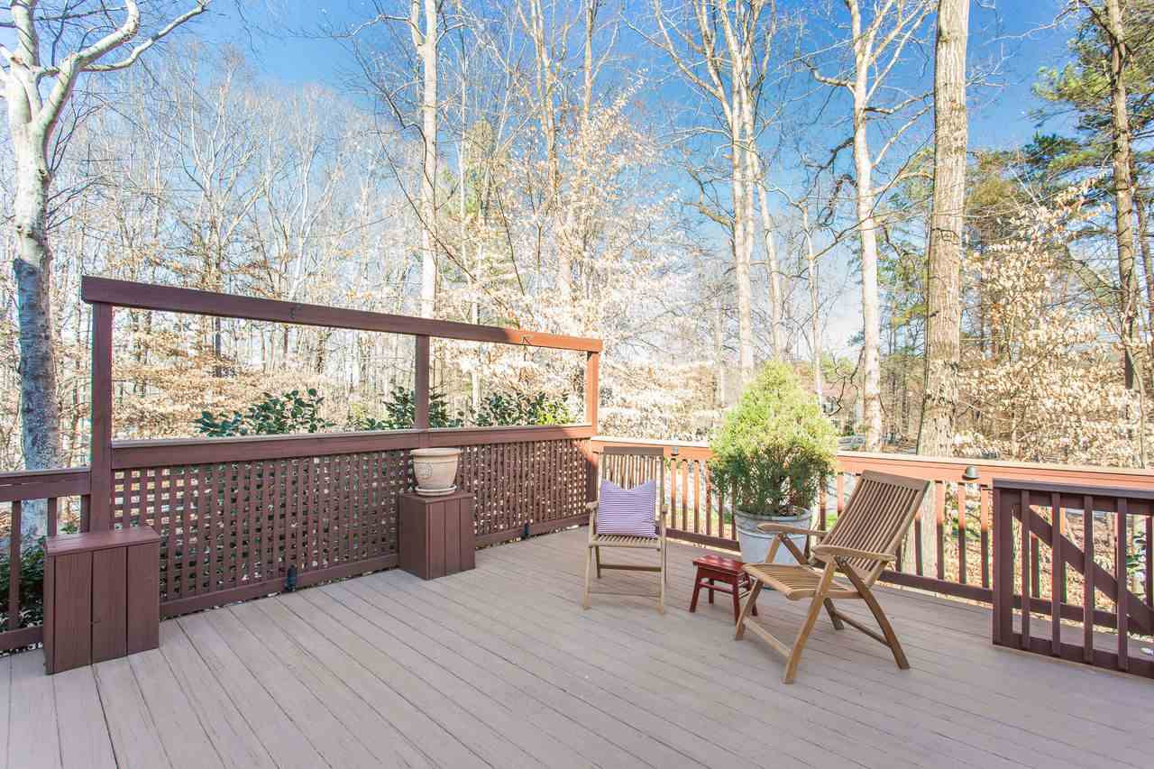 8816 Stage Ford Road Raleigh, NC 27615 - Photo 8 of 29 Railing, planters, and gated to keep the little ones and pets safe Incredible Deck!