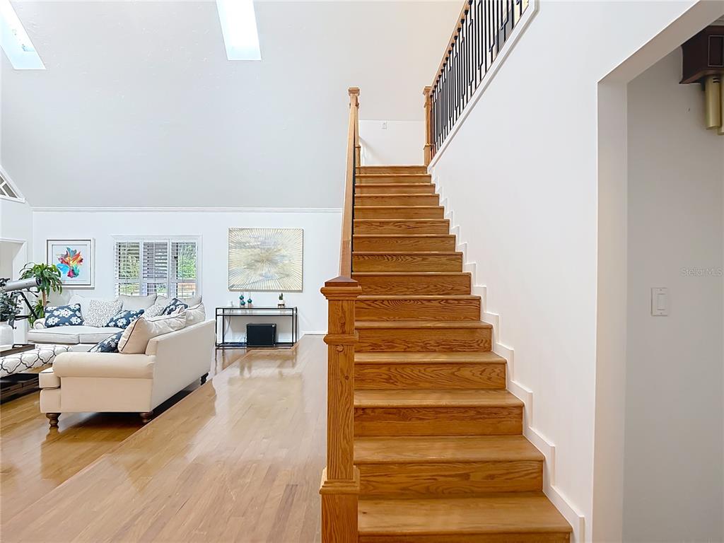 2130 Southwest 37th Street Road Ocala, FL 34471 - Photo 4 of 33 a view of entryway and hall with wooden floor