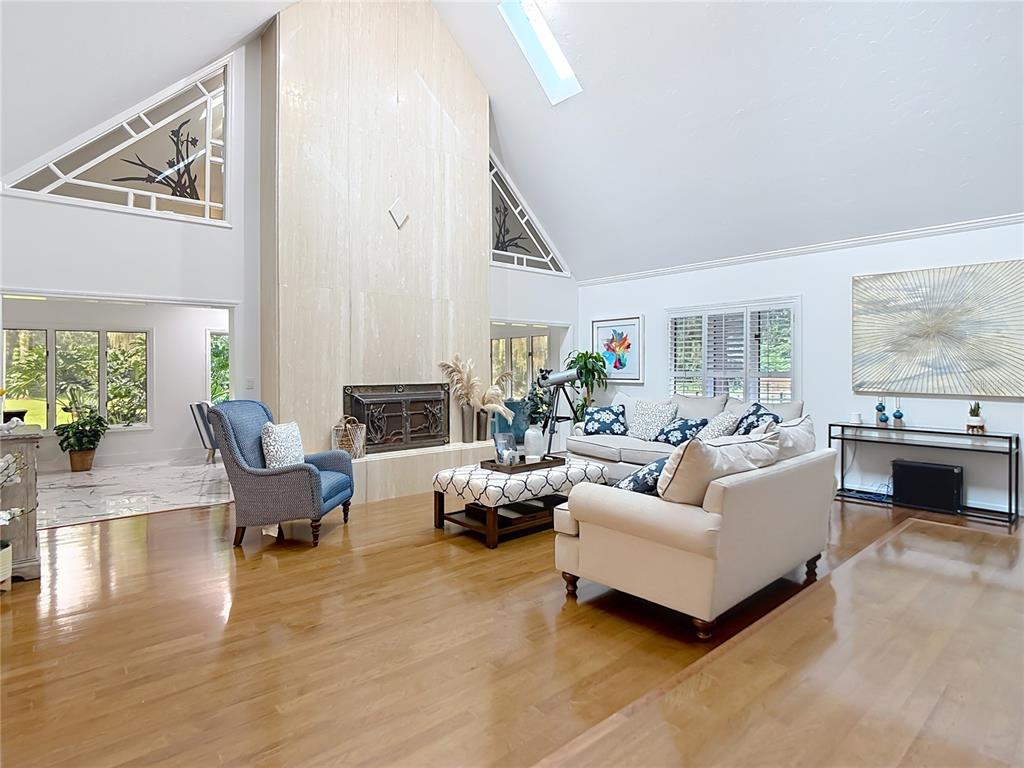 2130 Southwest 37th Street Road Ocala, FL 34471 - Photo 5 of 33 a living room with furniture and a large window