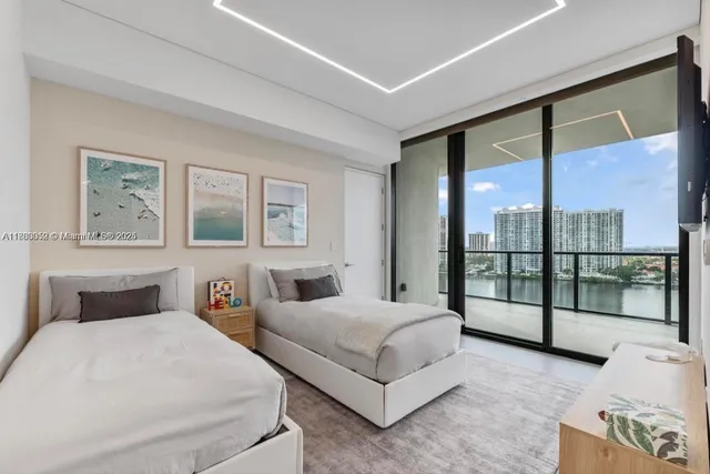 a bathroom with a bathtub shower sink and toilet