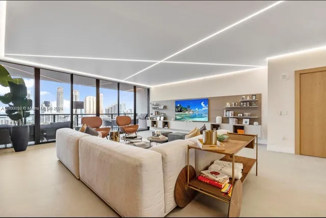 a view of a livingroom with furniture and window