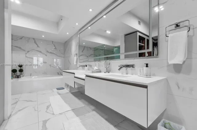 a view of a dining room with furniture and window